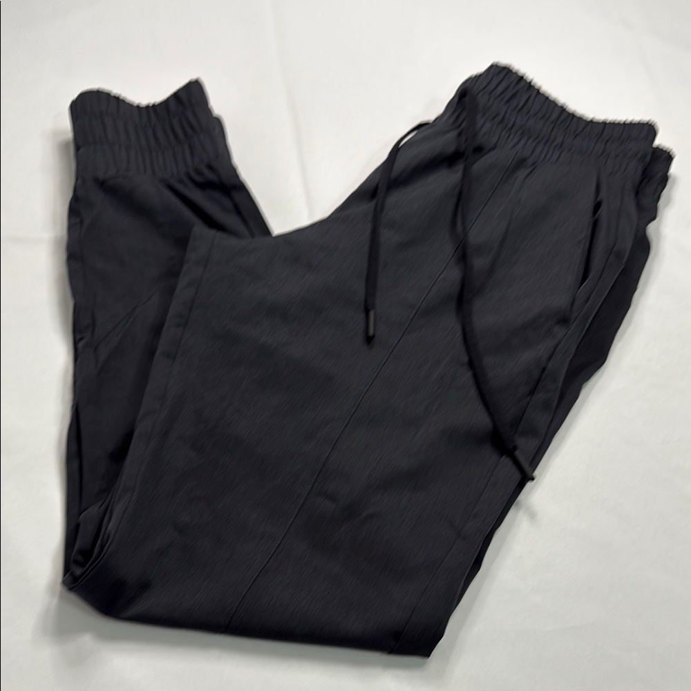 ZYIA Black Sweatpants with Tapered Legs and Elastic Cuffs